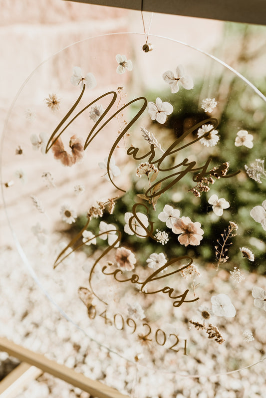 Panneau de bienvenue rond fleurs pressées